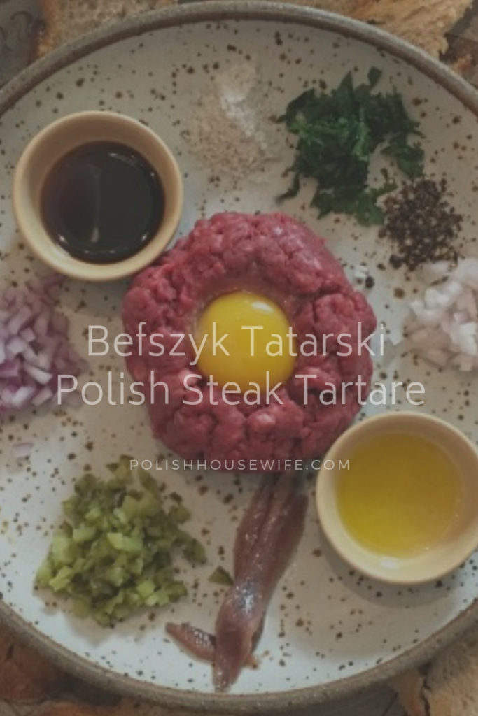 ingredients for steak tartare on a platter 