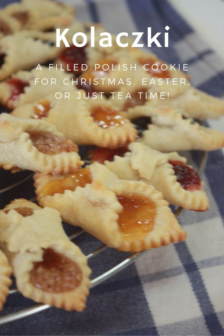 Polish filled cookies, kolaczki, on a cooling rack