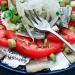 pickled herring with tomato and onions
