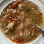 cabbage roll soup in a white bowl